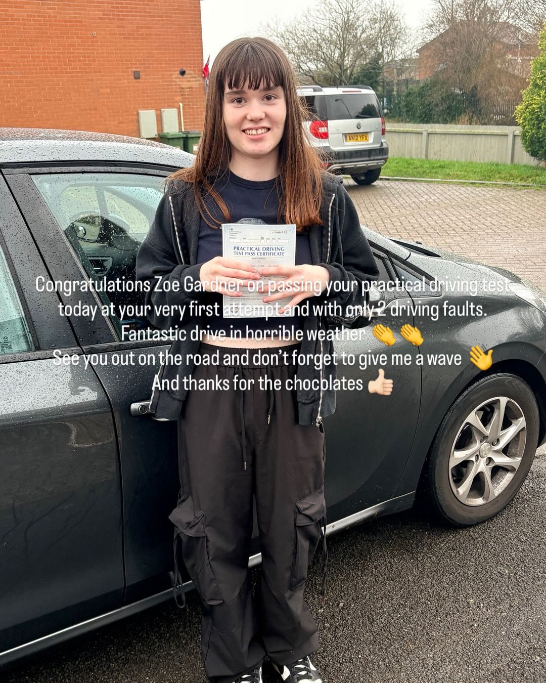 Zoe celebrating a first-time driving test pass with Ian's School of Motoring in Leicester